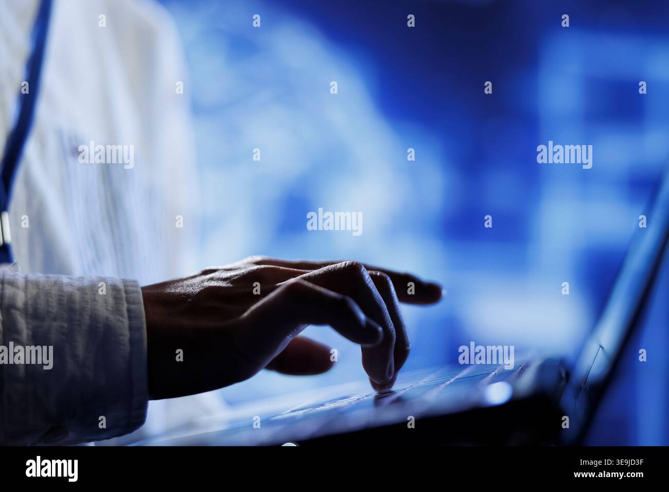 Licensed technician writes code on laptop to visualize artificial intelligence neural networks using augmented reality technology, close up. Server hub expert runs AI script for information processing Stock Photo