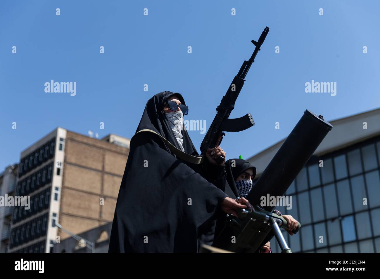 4/17/2026 A woman member of the Basij paramilitary, affiliated with ...