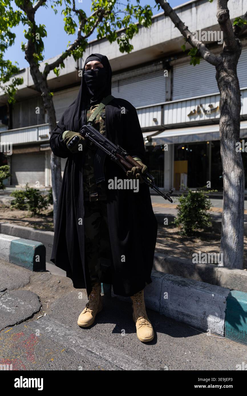 4/17/2026 A woman member of the Basij paramilitary, affiliated with ...