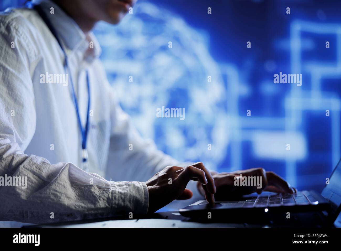 Computer operator in data center uses device for artificial intelligence computing simulating human brain through self learning algorithms. Tech support working with AI deep neural networks Stock Photo