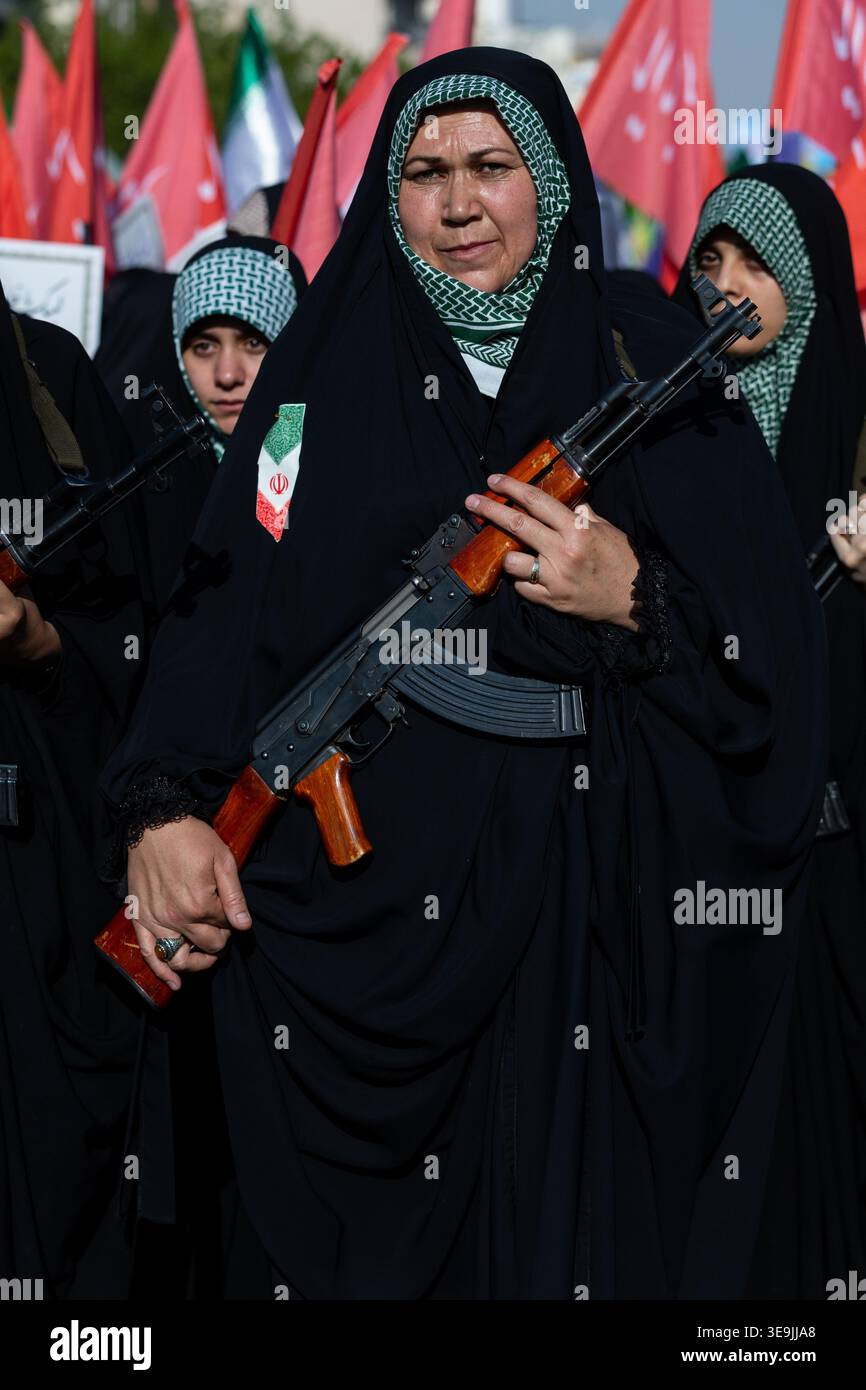 4/17/2026 A woman member of the Basij paramilitary, affiliated with ...