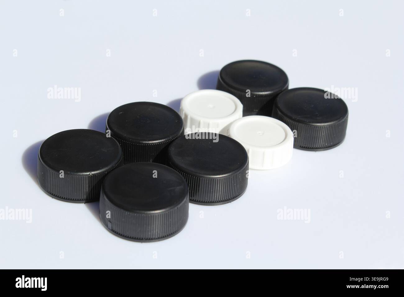 Plastic bottle caps on a white background Stock Photo