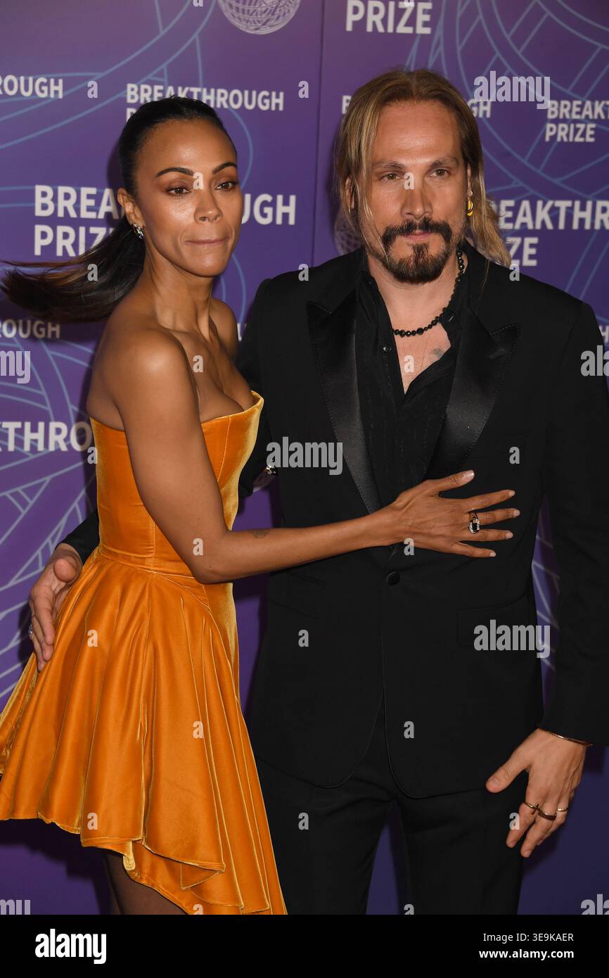 SANTA MONICA, CA - APRIL 18: Zoe Saldana and Marco Perego-Saldana at ...
