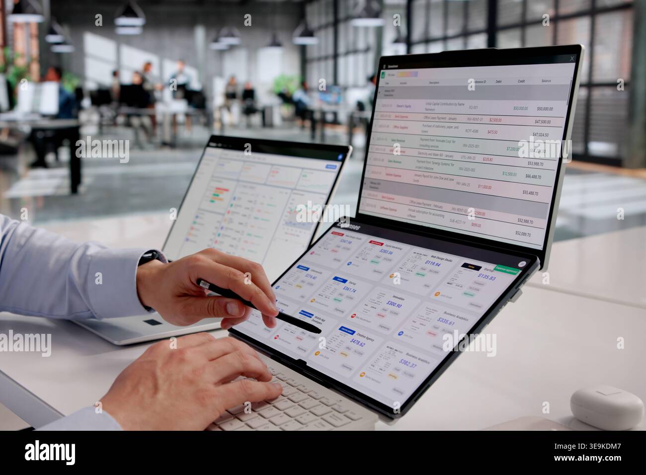 Finance Manager Analyzing Expense Reports With Cutting-Edge Tracking Technology Stock Photo