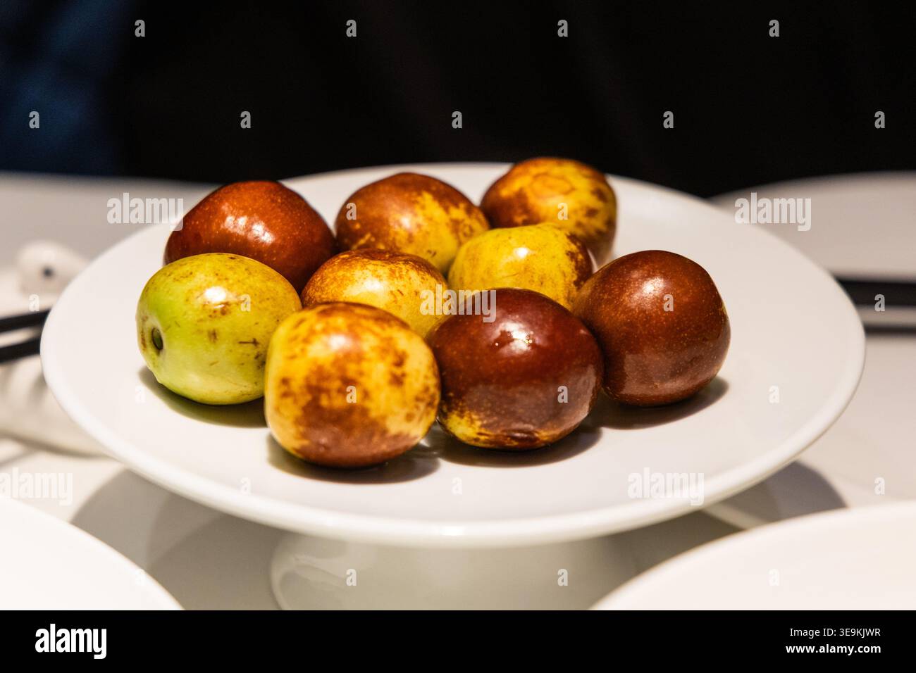 Fresh jujube fruit or commonly known as red dates, is nutritious and nourishing food. Stock Photo