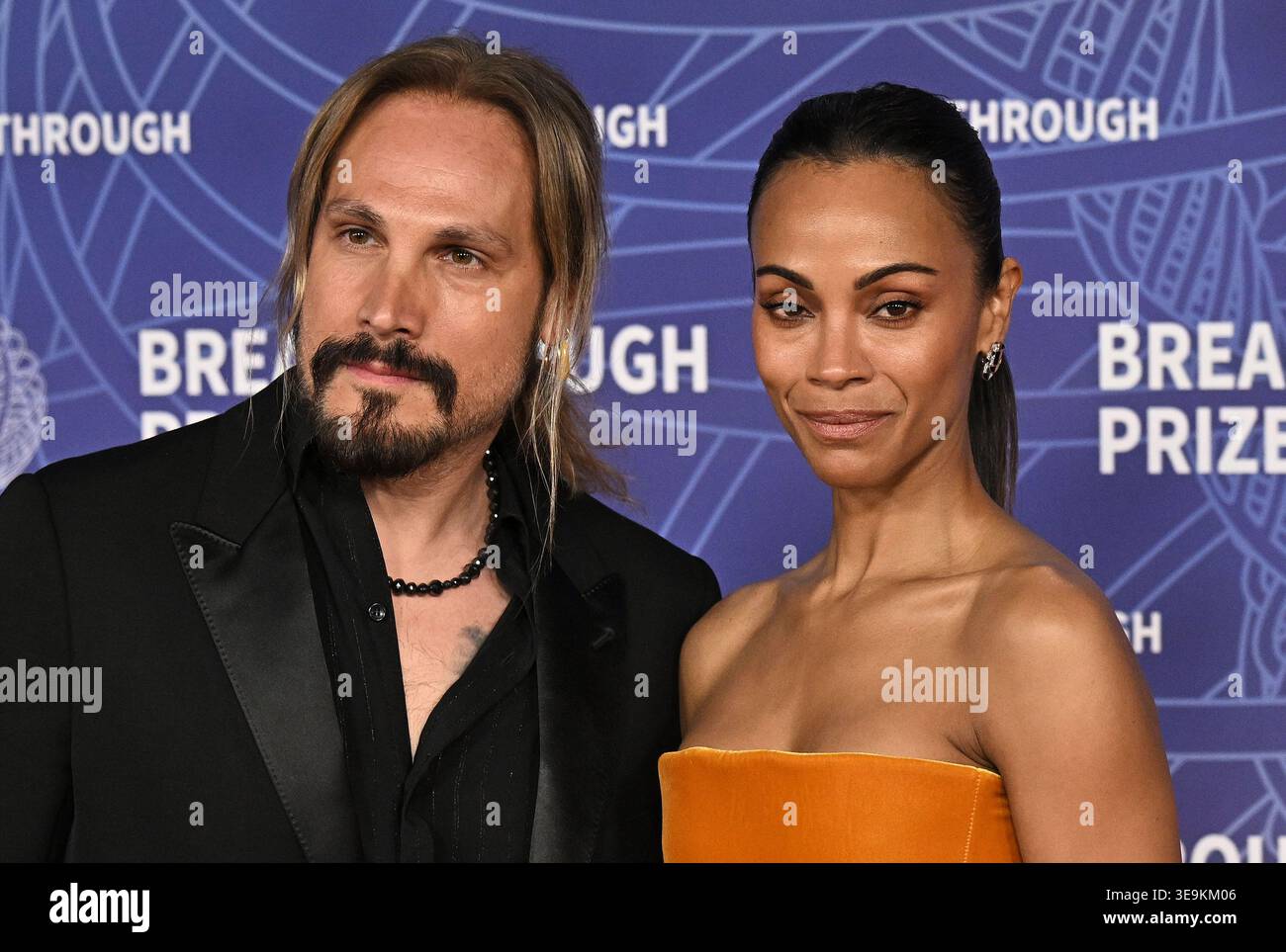 Marco Perego and Zoe Saldana arriving to the 12th Breakthrough Prize ...