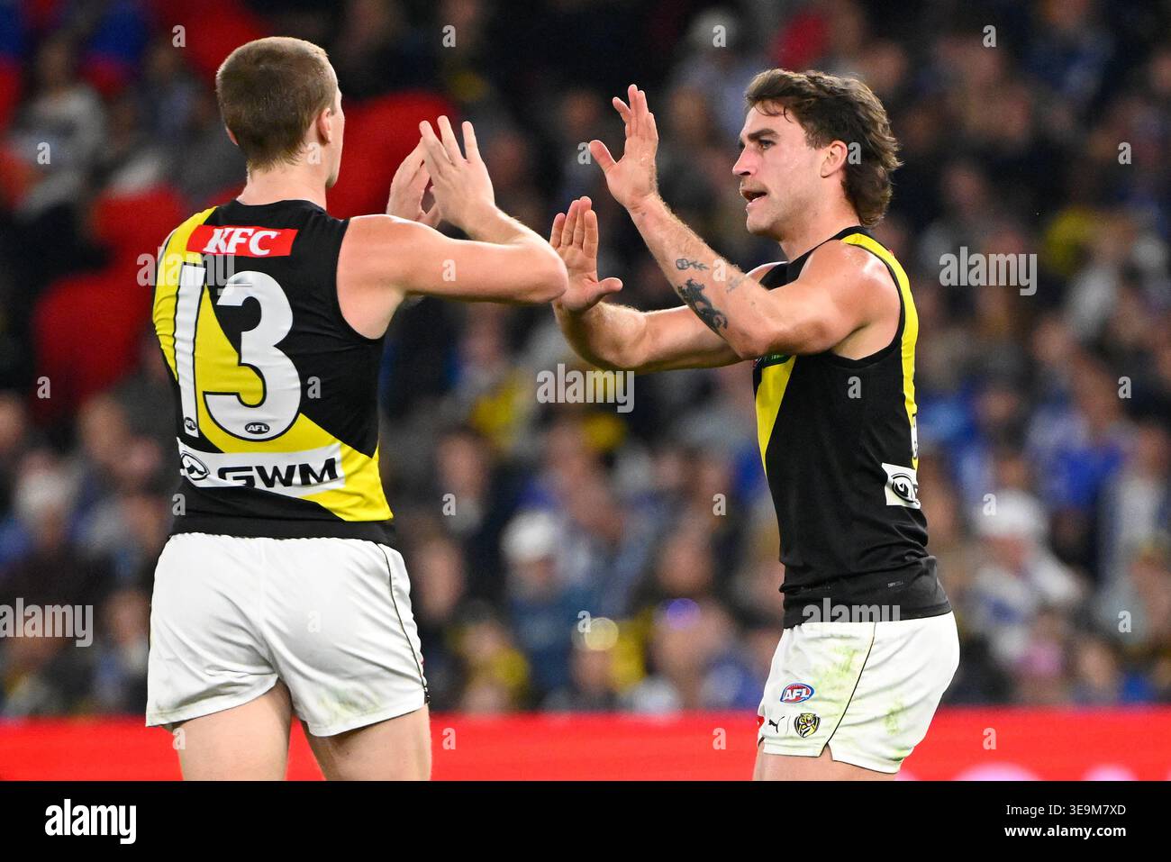Hugo Ralphsmith Melbourne, Australia. 19th Apr, 2026. Jack Ross of the Tigers (right ...