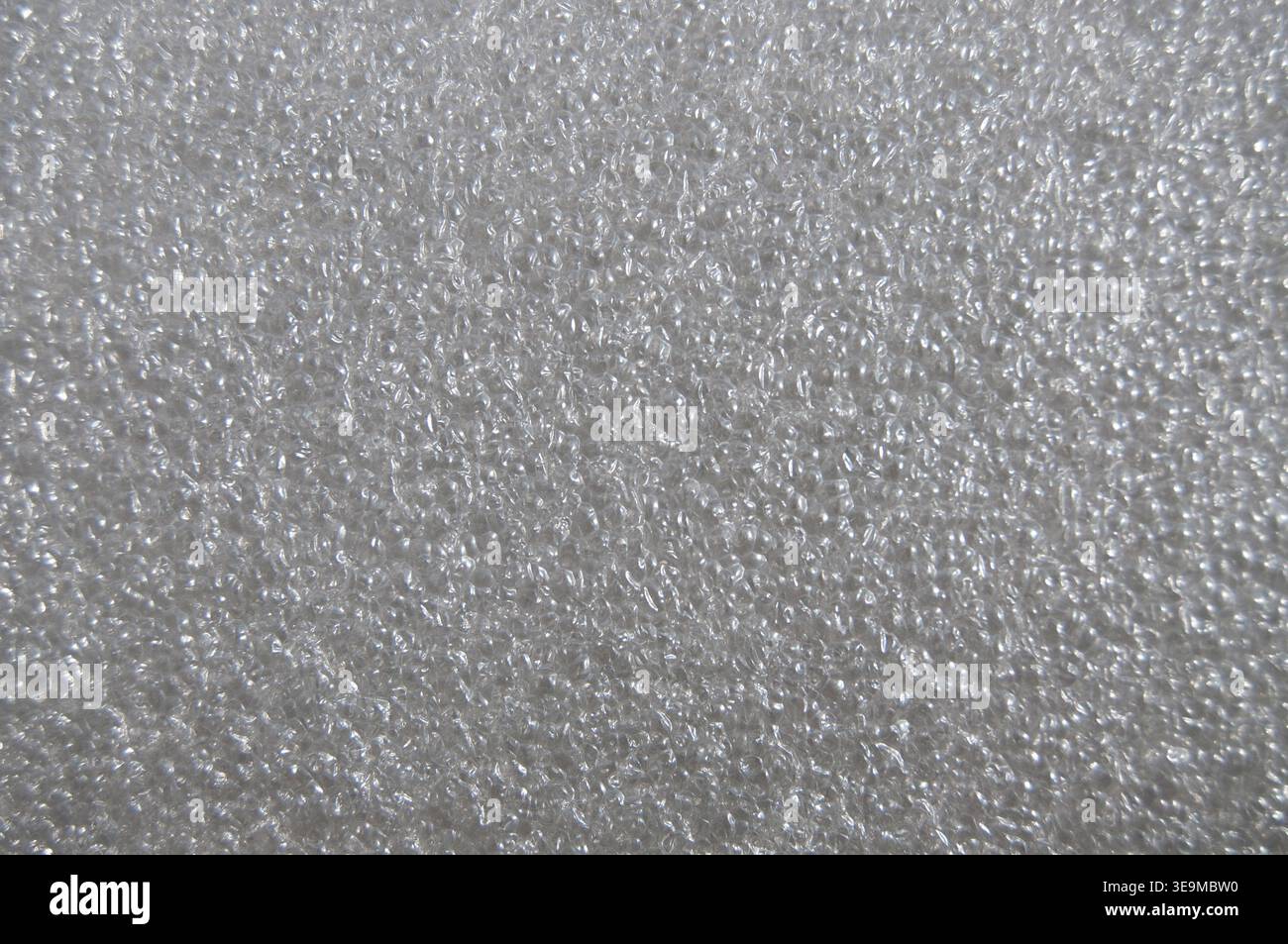Polyethylene foam surface background. Gray bubbled texture. Stock Photo