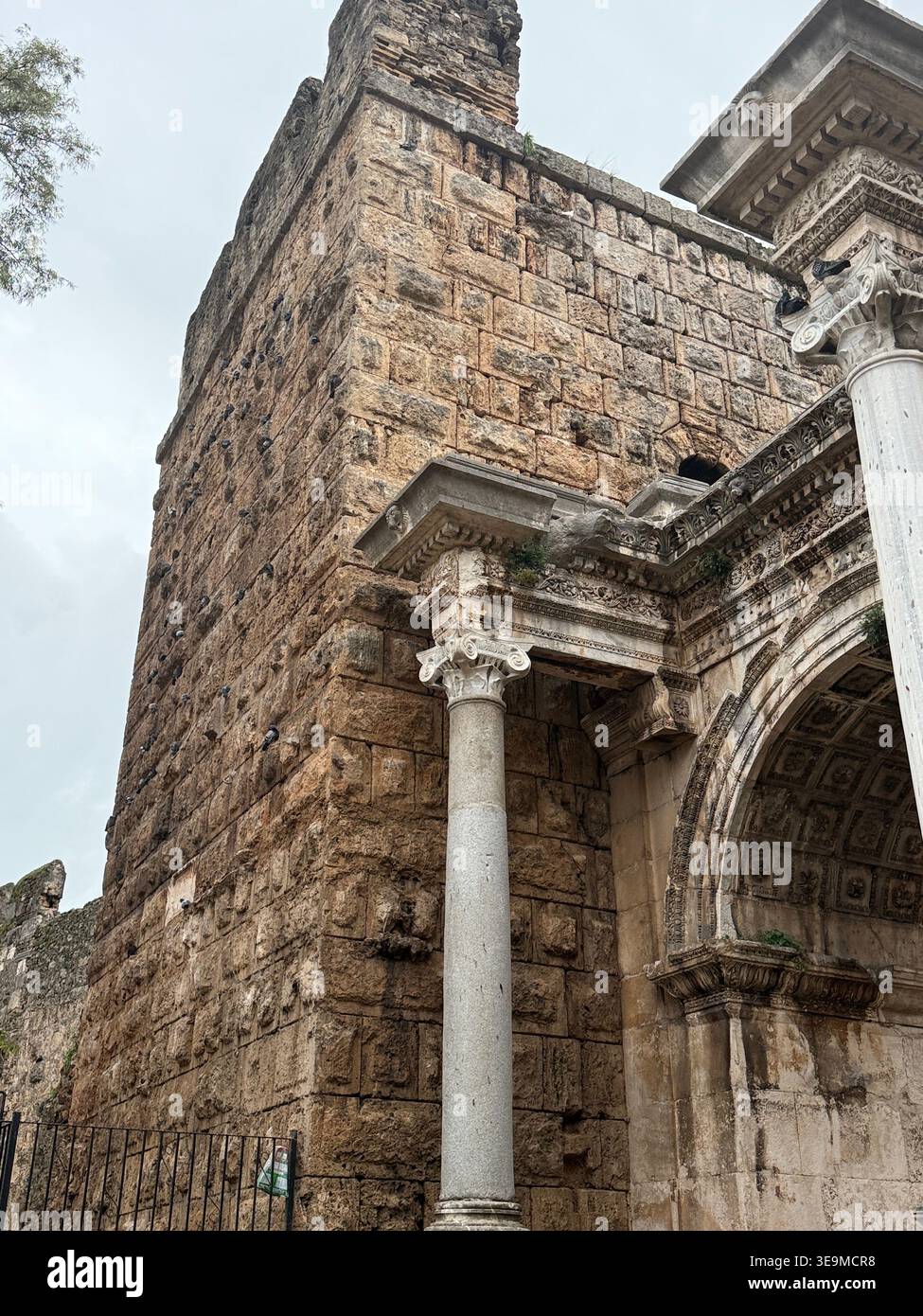Ancient Roman architecture featuring stone columns and arch in ...