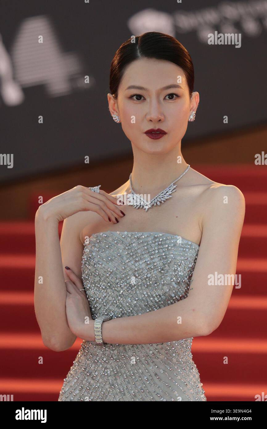 Fish Liew arrives on the red carpet for the 44th Hong Kong Film Awards ...