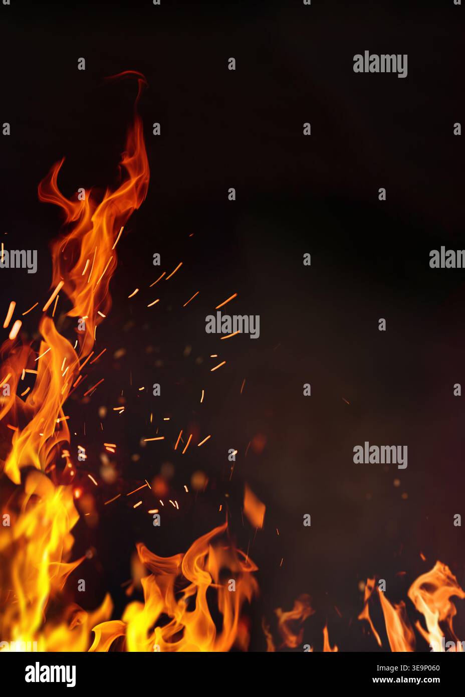 Barbeque poster fire with copy space. Fire embers particles over black background. Fire sparks background. Abstract dark glitter fire particles lights Stock Photo