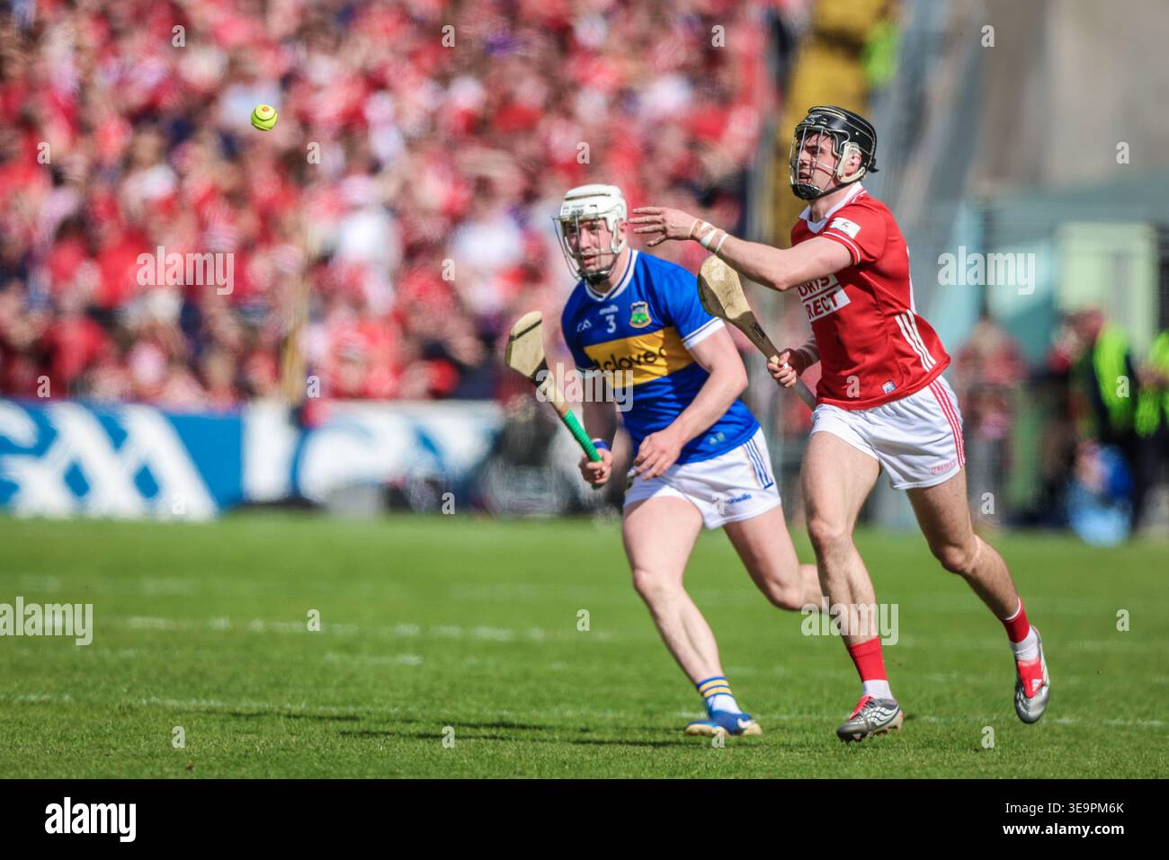 Thurles, Ireland. 19 April, 2026. Darragh Fitzgibbon of Cork passes the ...