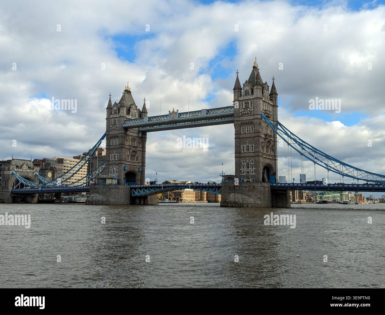 Iconic Tower Bridge over the River Thames under a dramatic cloudy sky, London, UK - Smartphone Captured Stock Image