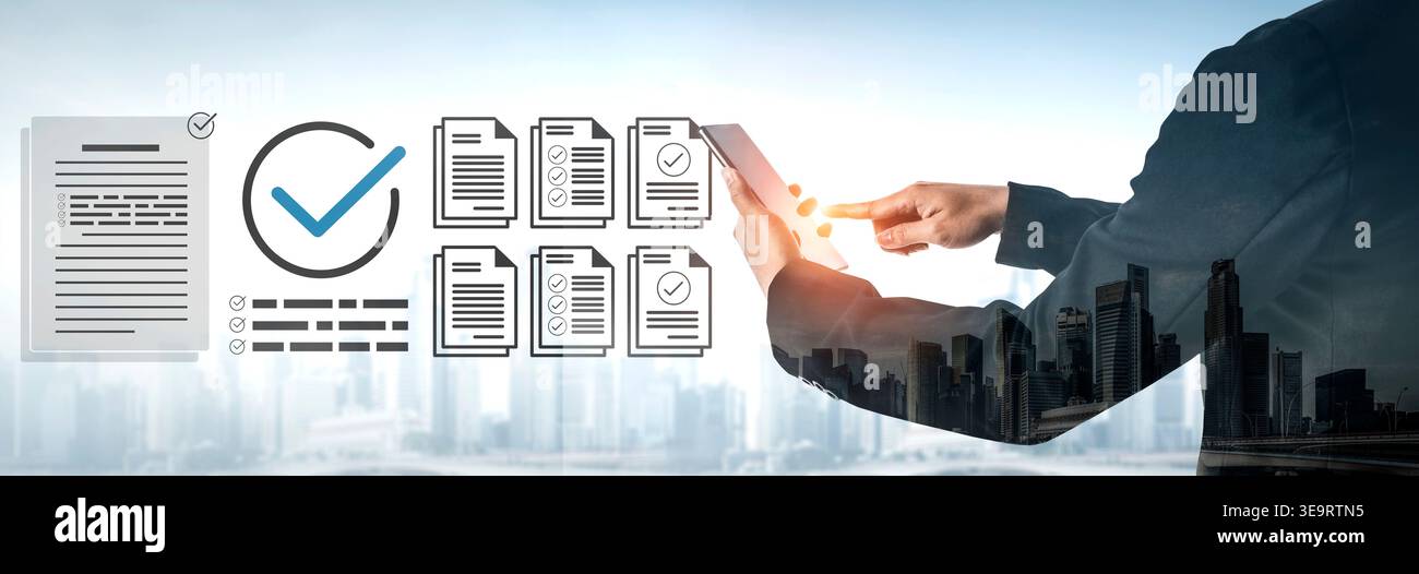 A businessman interacts with digital documents on a tablet, symbolizing modern workflow automation and document verification against an urban skyline Stock Photo