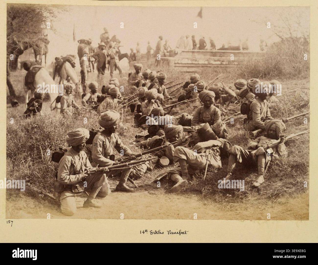 14th Sikhs was a regiment of the British Indian Army. The archival photographic record, taken by Deen Dayal in 1886, documents the regiment at Panipat. The historical photographic print preserves uniformed soldiers in formation during the late 19th century. Stock Photo
