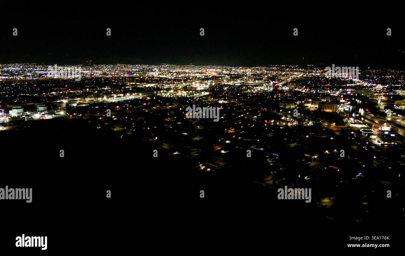 Night aerial view of city lights and urban skyline Stock Photo - Alamy