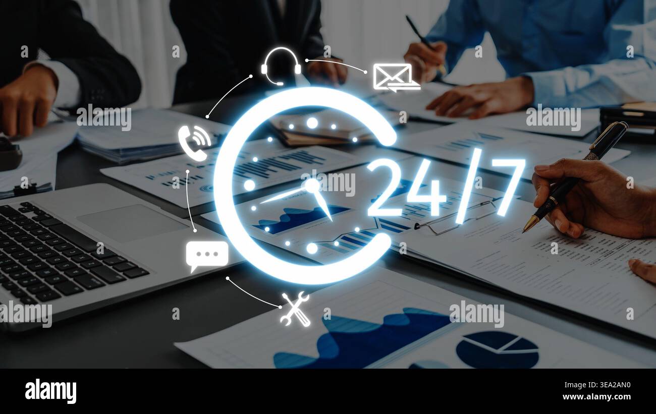 A dynamic office scene showcasing teamwork and strategy development, emphasizing continuous support and data analysis for business growth and success Stock Photo