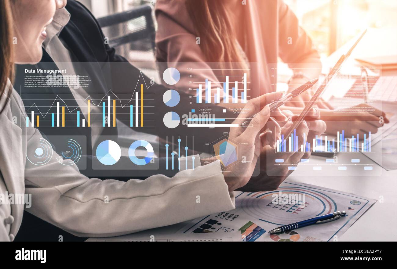 Two professionals analyze data using touchscreen technology, showcasing ...