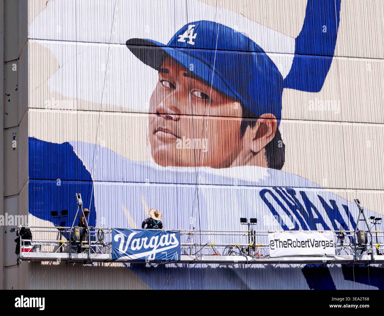 World-renowned muralist ROBERT VARGAS puts the finishing touches on the ...