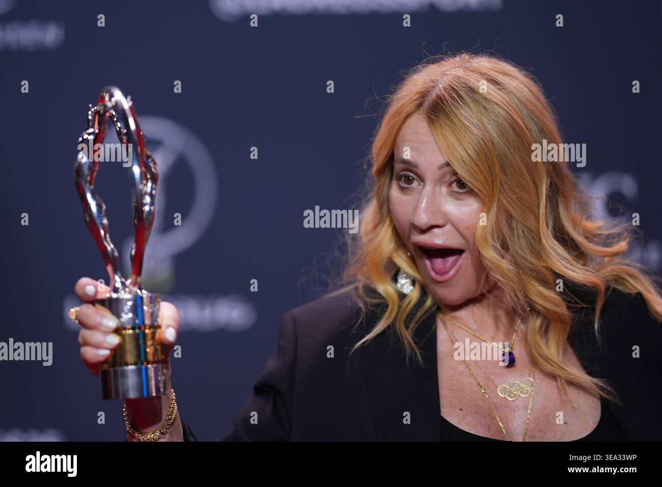 Retired Romanian Gymnast Nadia Comaneci Poses With With The Lifetime retired-romanian-gymnast-nadia-comaneci-poses-with-with-the-lifetime