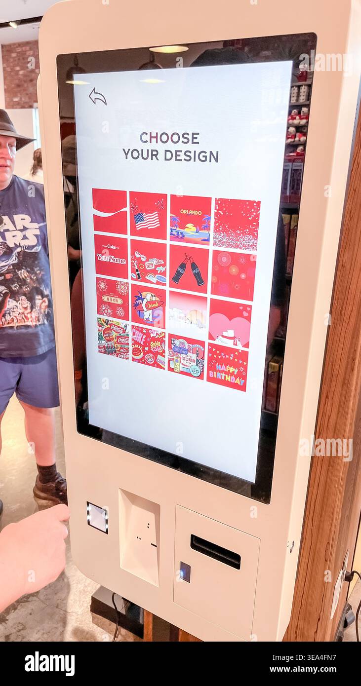 Orlando FL, USA - March 06, 2026: Coca-Cola vending machine features a ...