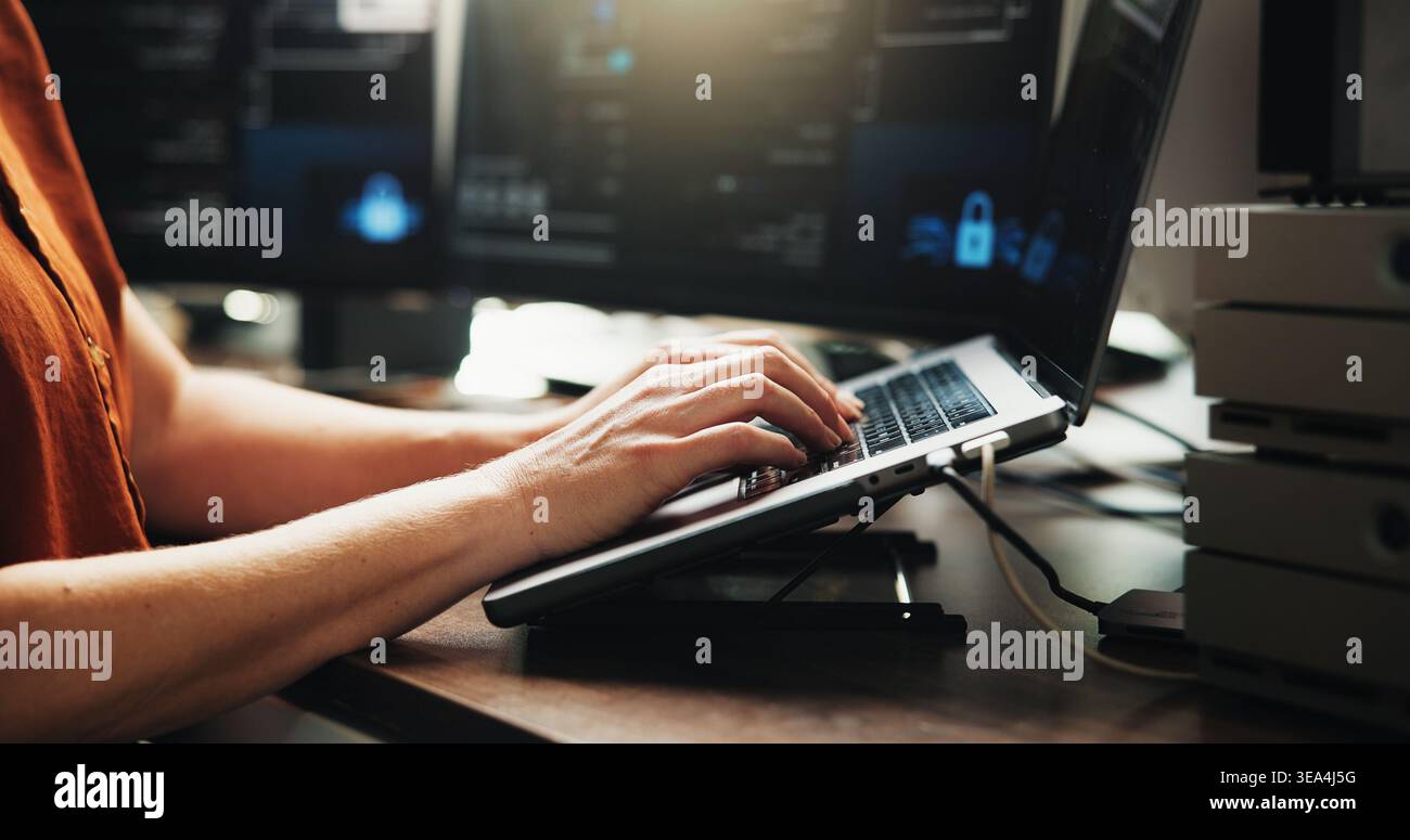 Laptop, typing and programmer with hands of person in office for web developer, coder or research. Software engineer, firewall update and coding Stock Photo