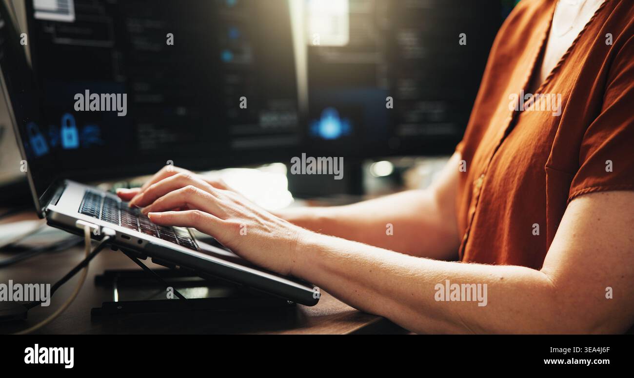 Laptop, typing and developer with hands of person in office for web programmer, coder or research. Software engineer, firewall update and coding Stock Photo