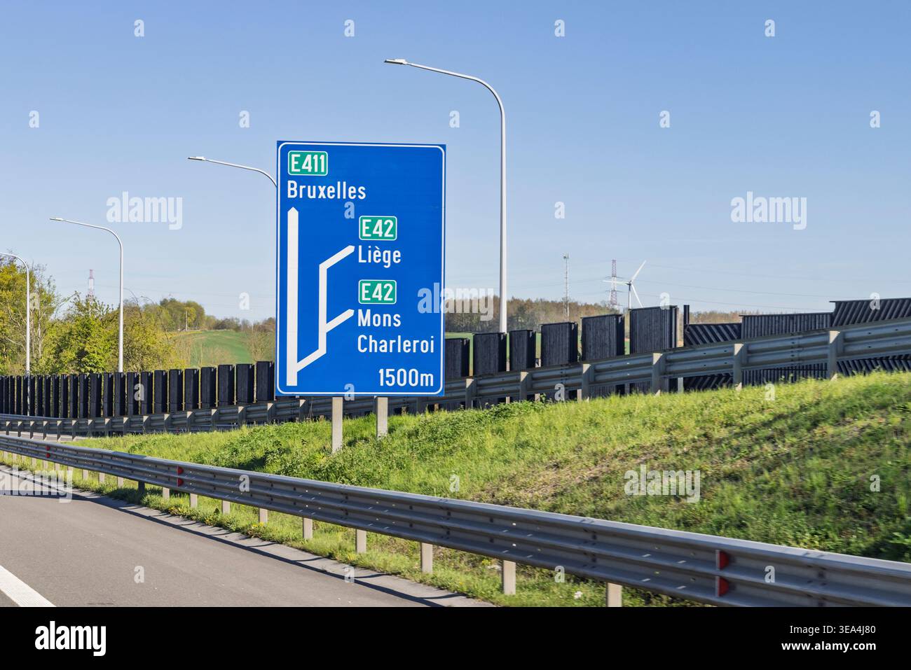 Belgium, April 8, 2026. Tall motorway signage indicating the upcoming ...