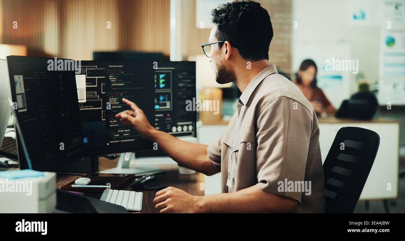 Computer, code and programmer with business man in office for web developer, research or database. Software engineer, firewall update and coding Stock Photo