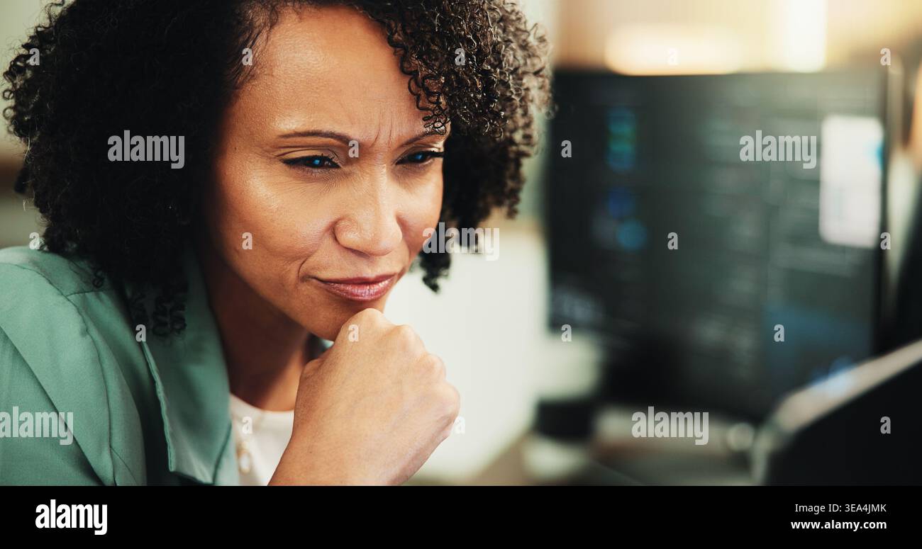 Computer, coding and thinking with woman in office for programmer, cyber security or cloud computing. Programming, reading and developer with person Stock Photo