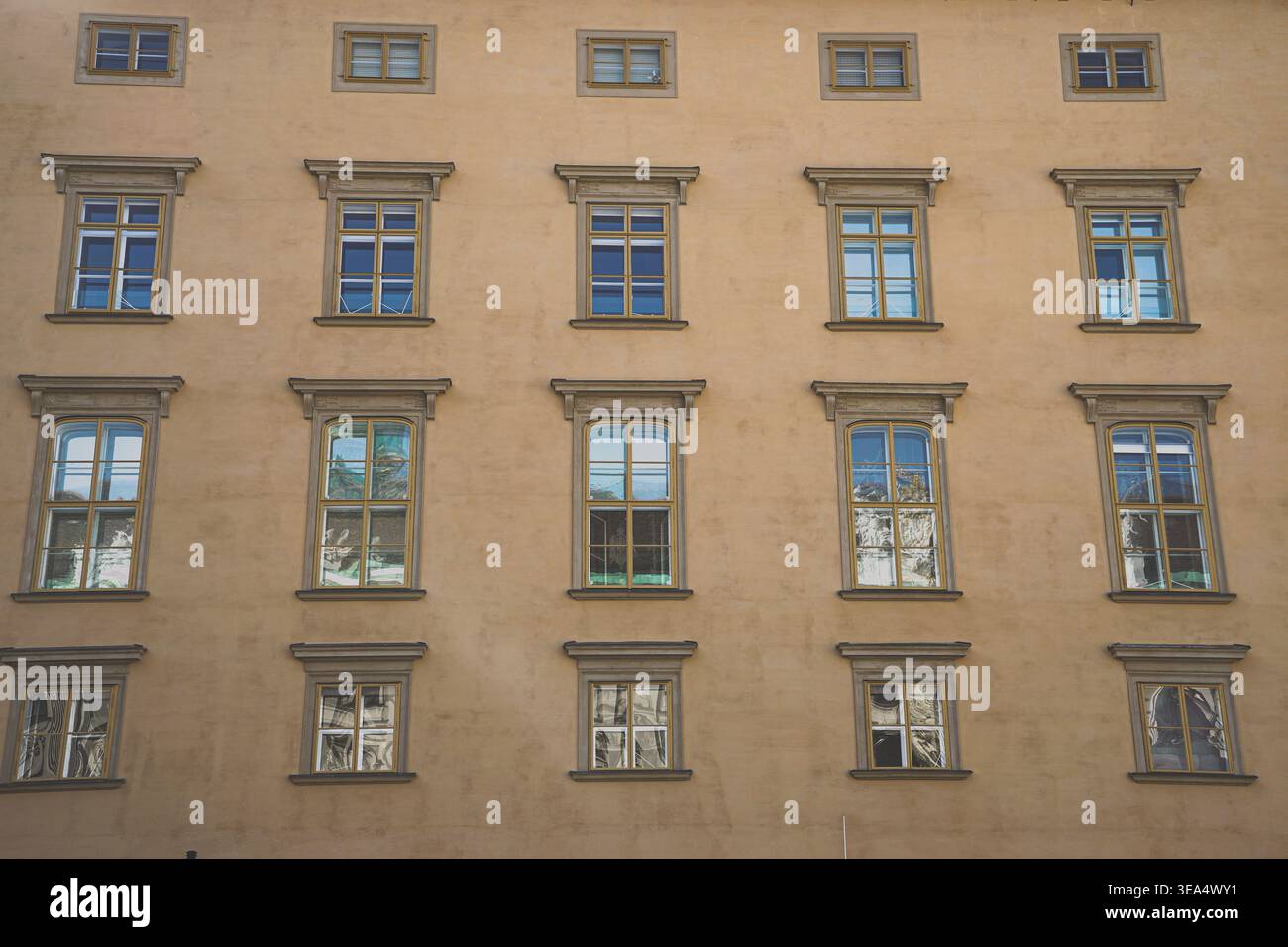 Beige exterior wall with repetitive window pattern european ...