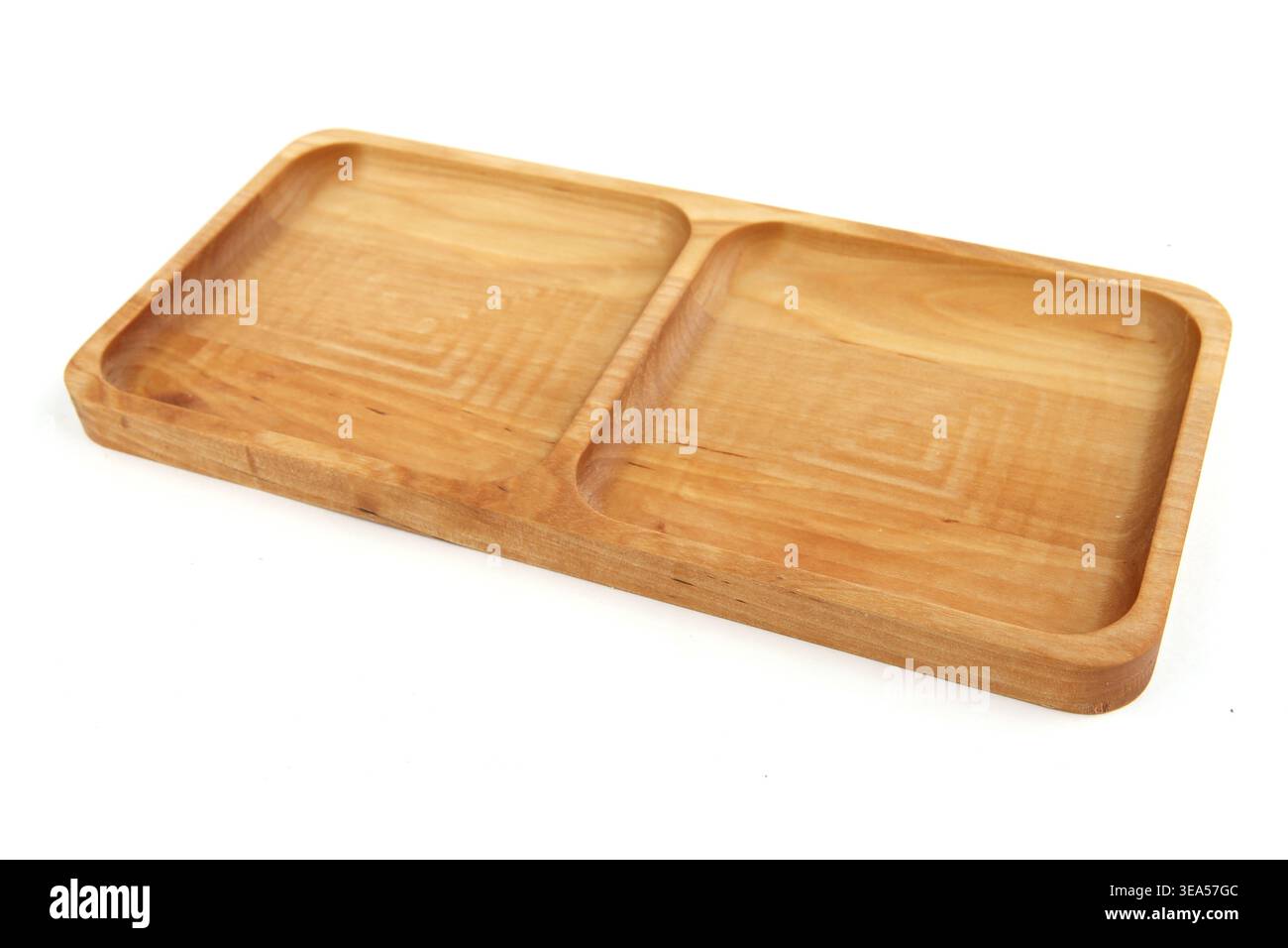 Portion wooden dish isolated on white background. Empty squared serving plate or tray. Stock Photo