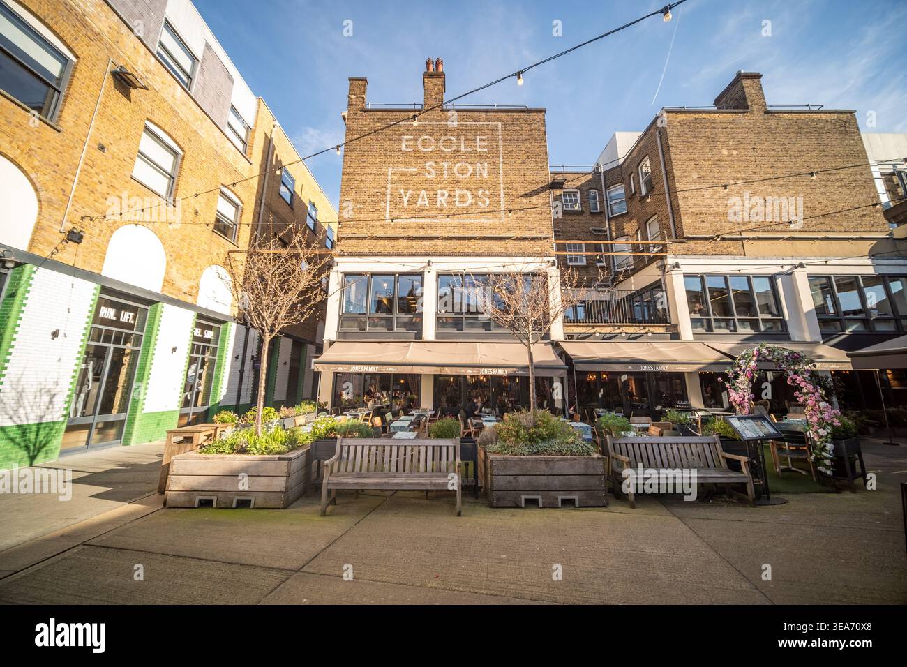 LONDON - MAY 02, 2026: Eccleston Yards Belgravia – Sunny courtyard with Eccleston Yards signage and outdoor dining. Stock Photo