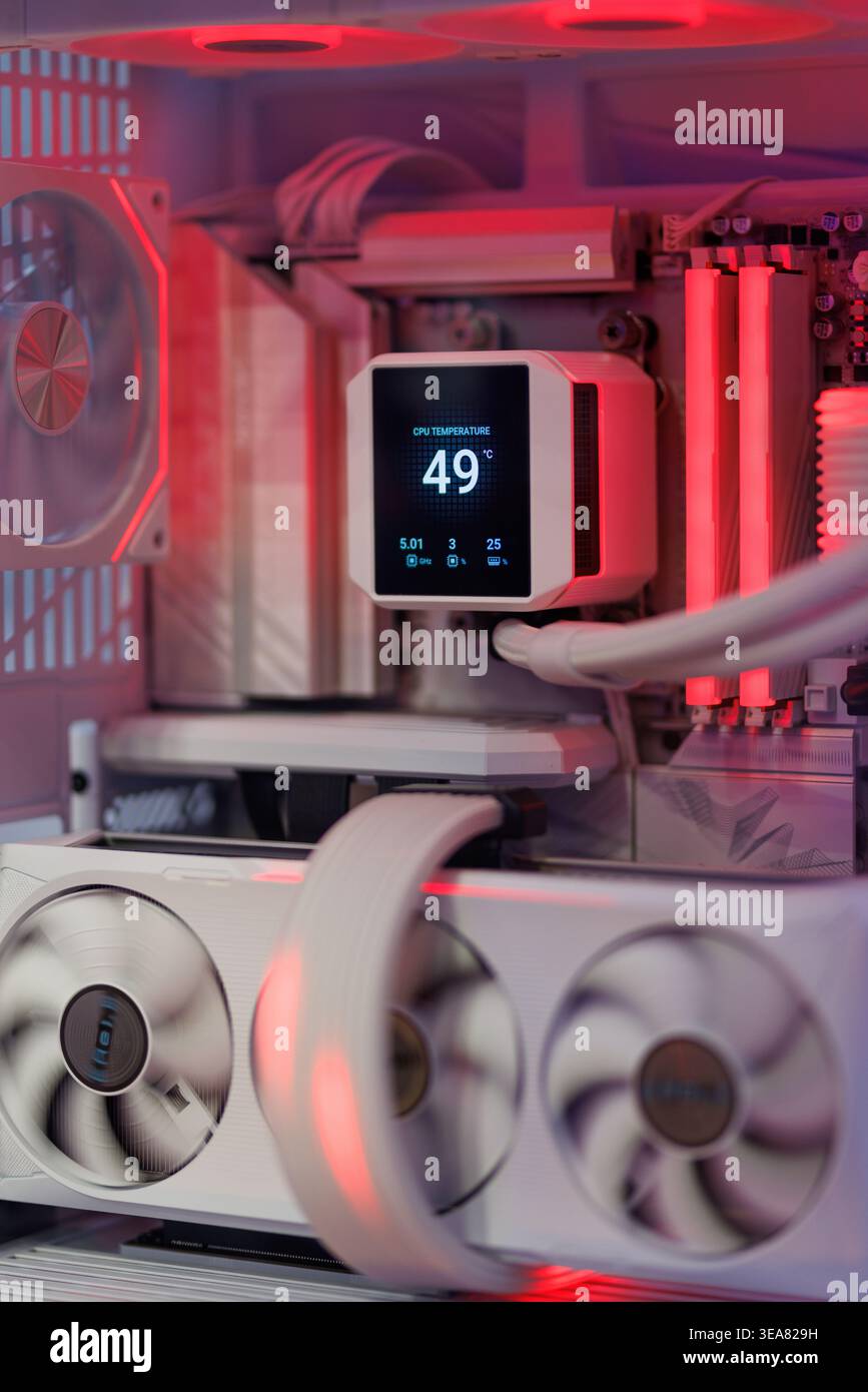 Custom gaming PC interior with white liquid CPU cooler Stock Photo
