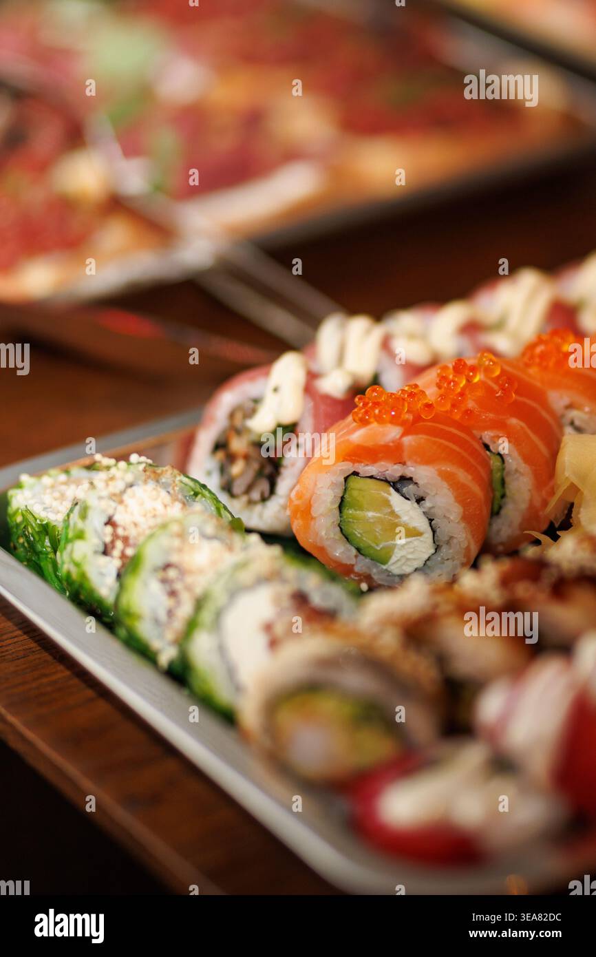 Close up of assorted sushi rolls with salmon and caviar Stock Photo
