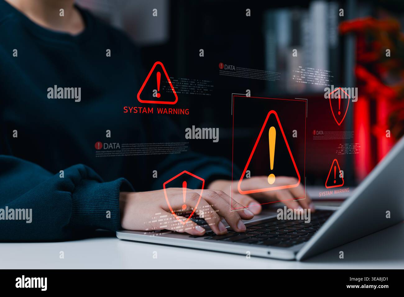 System Warning Alert for Cybersecurity Risk and Data Threat Concept. Woman using laptop with alert icons and system warning. data risk, cyber threat d Stock Photo