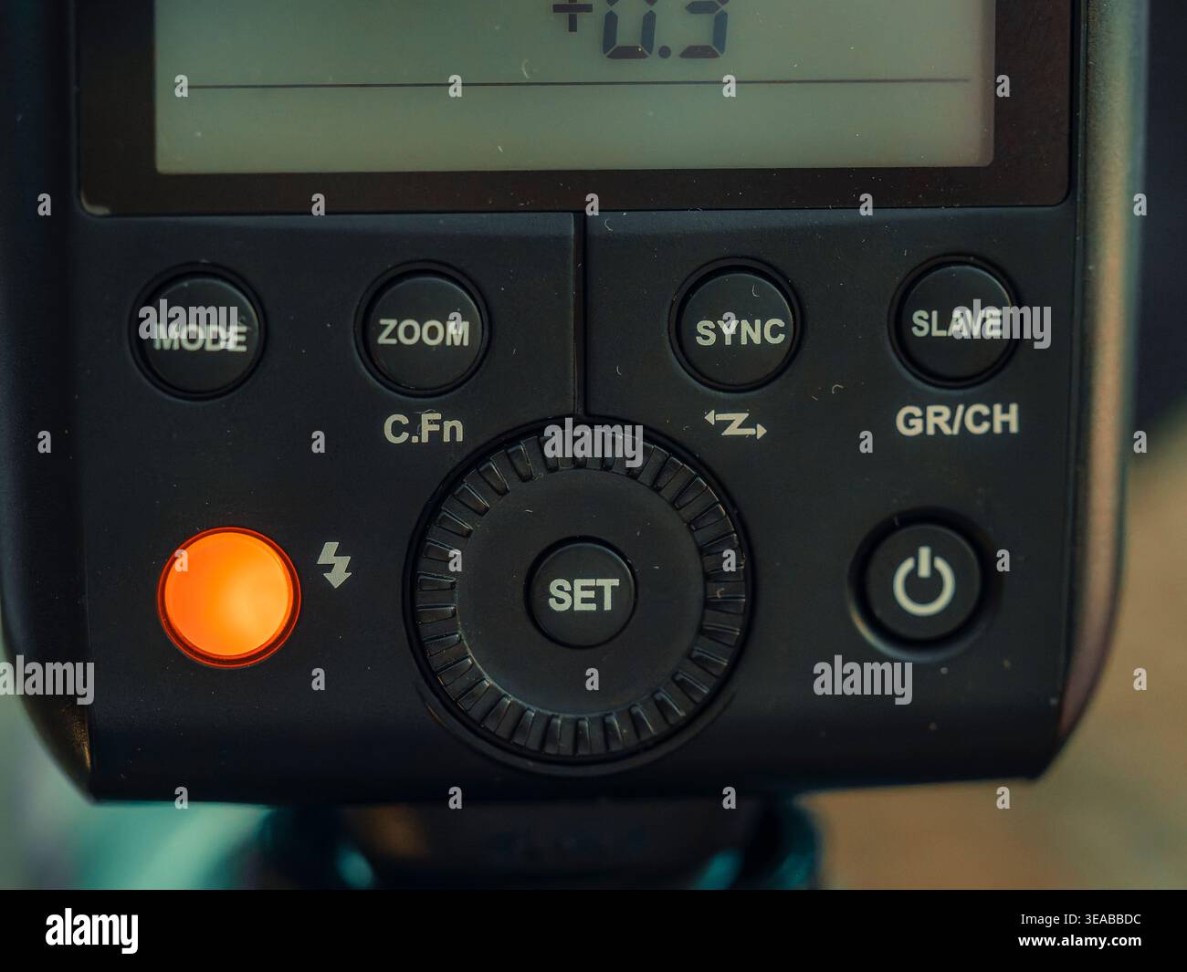 Macro closeup of camera flash control panel with illuminated test ...