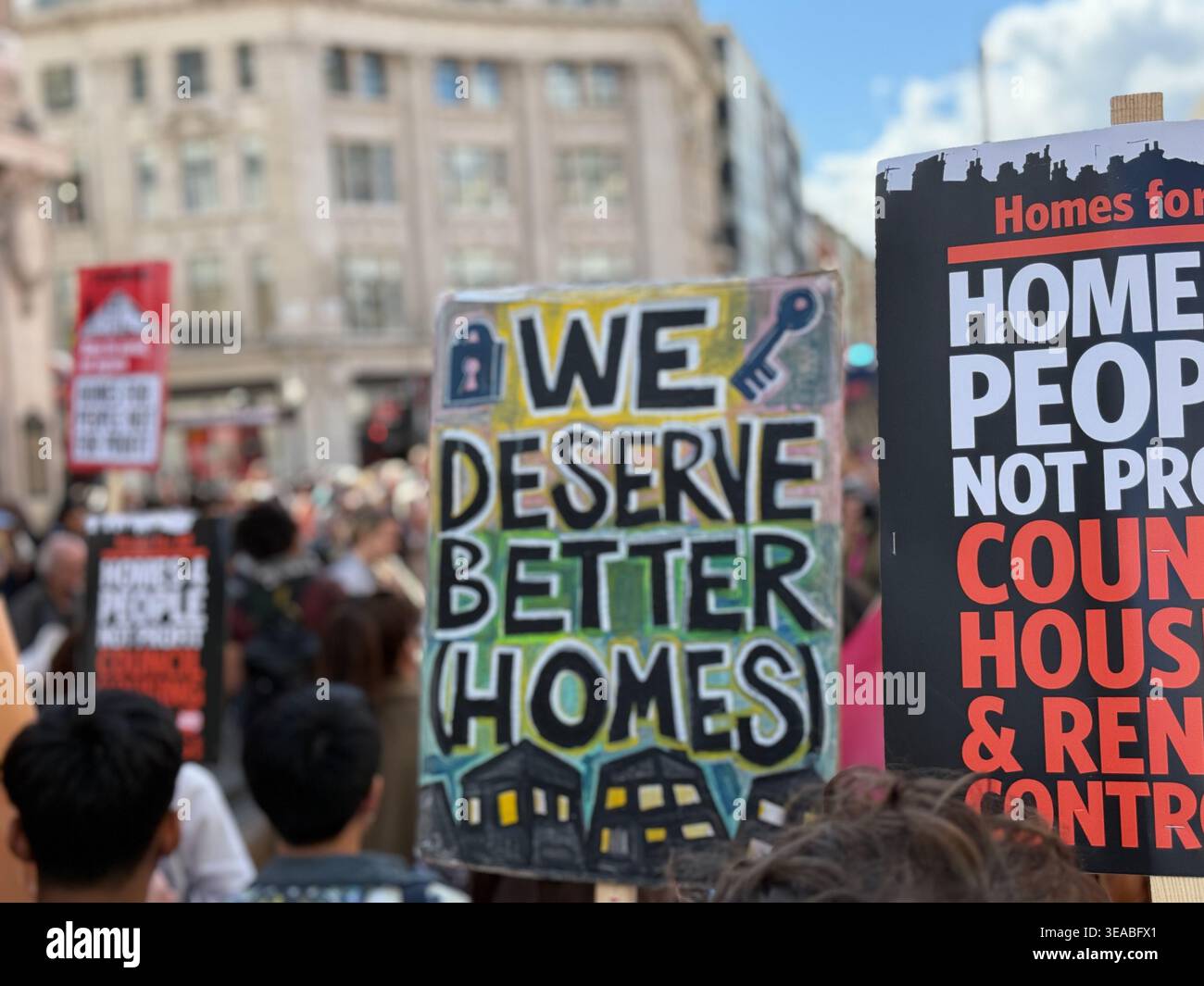 Signs are held up at the National Housing Demo on 18 April 2026 in London, UK - Smartphone Captured Stock Image