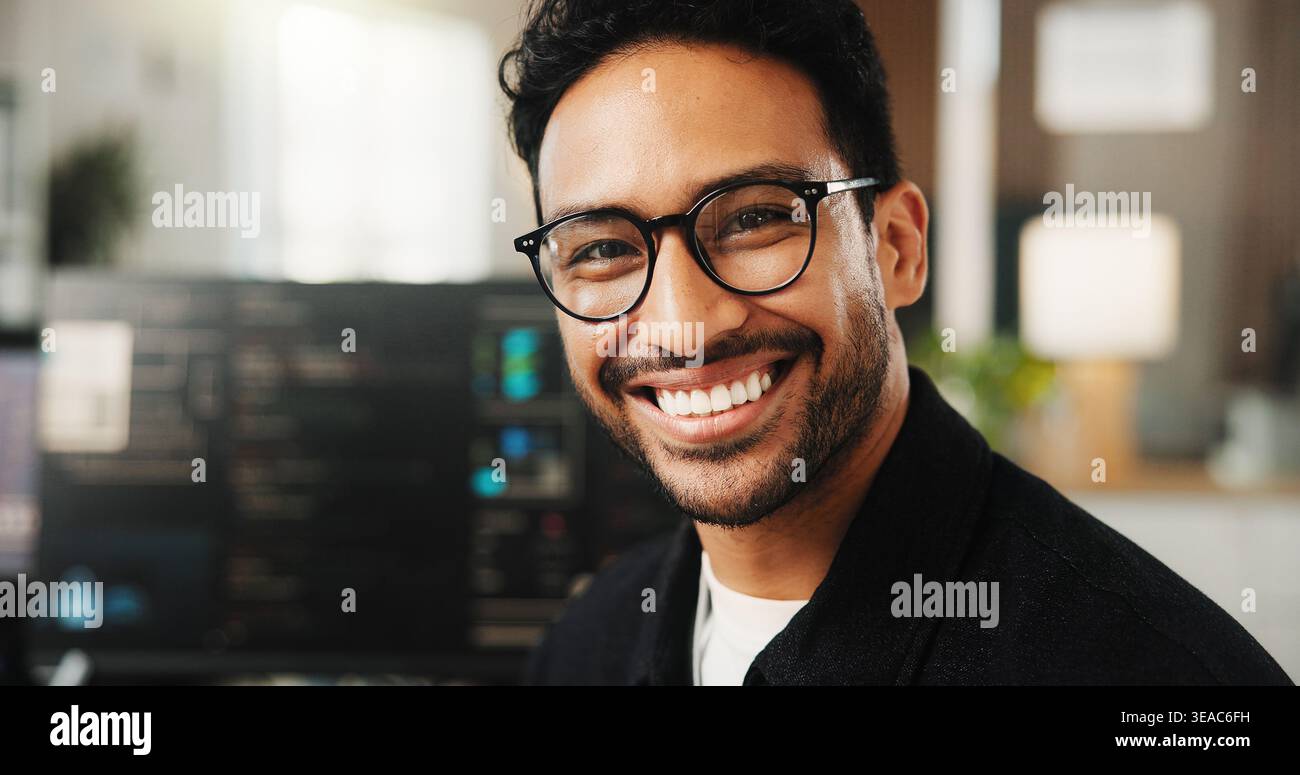Portrait, programmer and man in office, smile and software development for website launch. Employee, programming and person in workplace, coding and Stock Photo