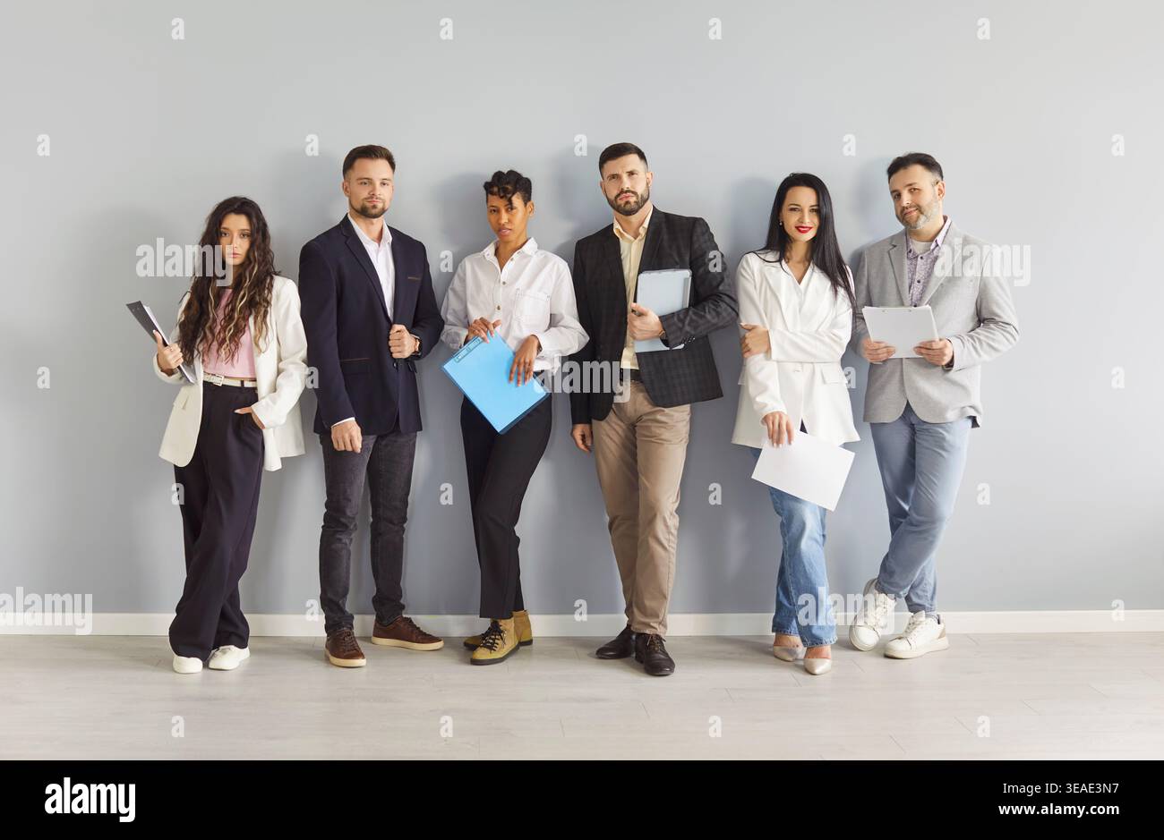 Six men and women hi-res stock photography and images - Alamy