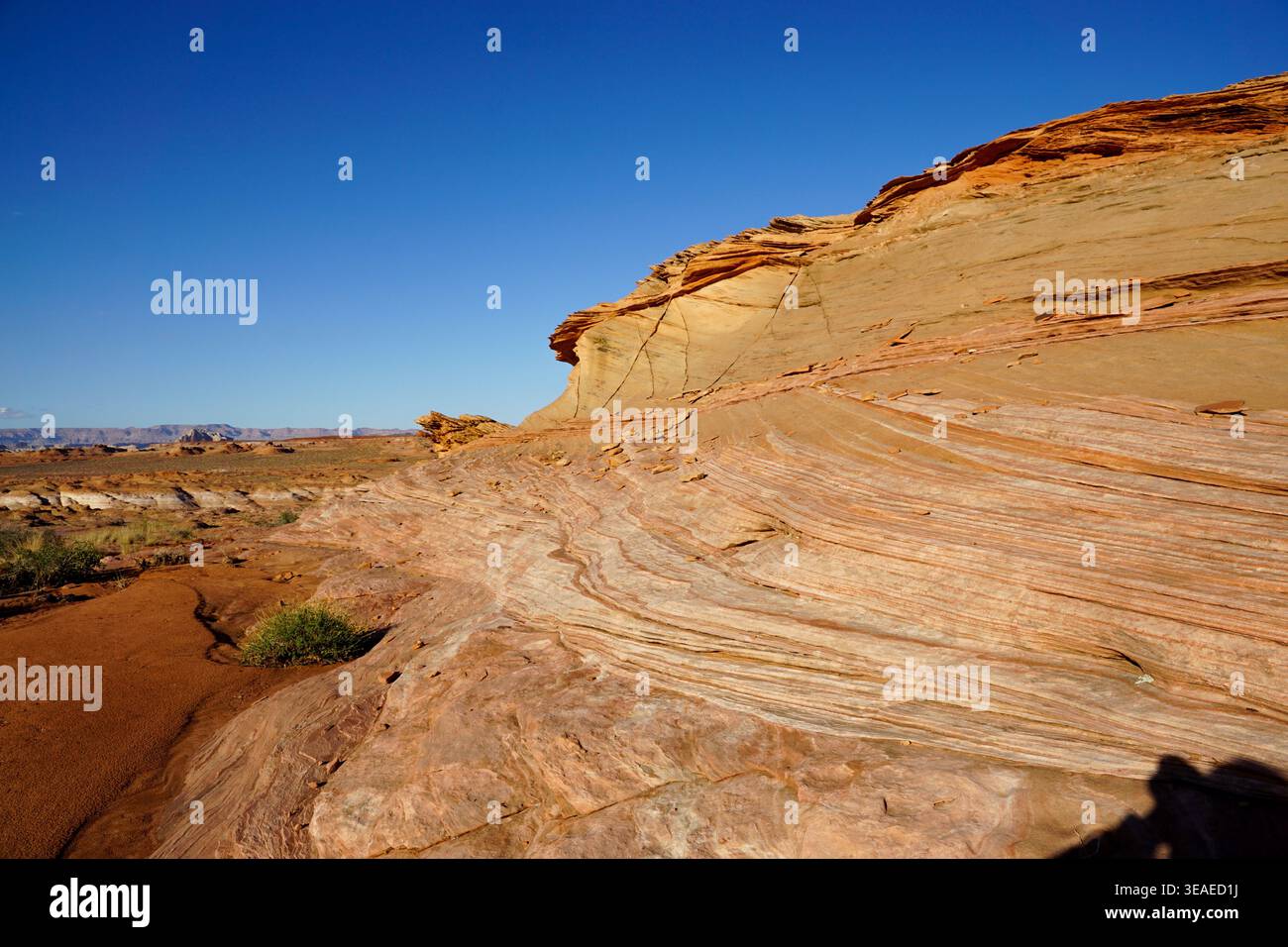 Sloping sedimentary rock with visible erosion patterns hi-res stock ...