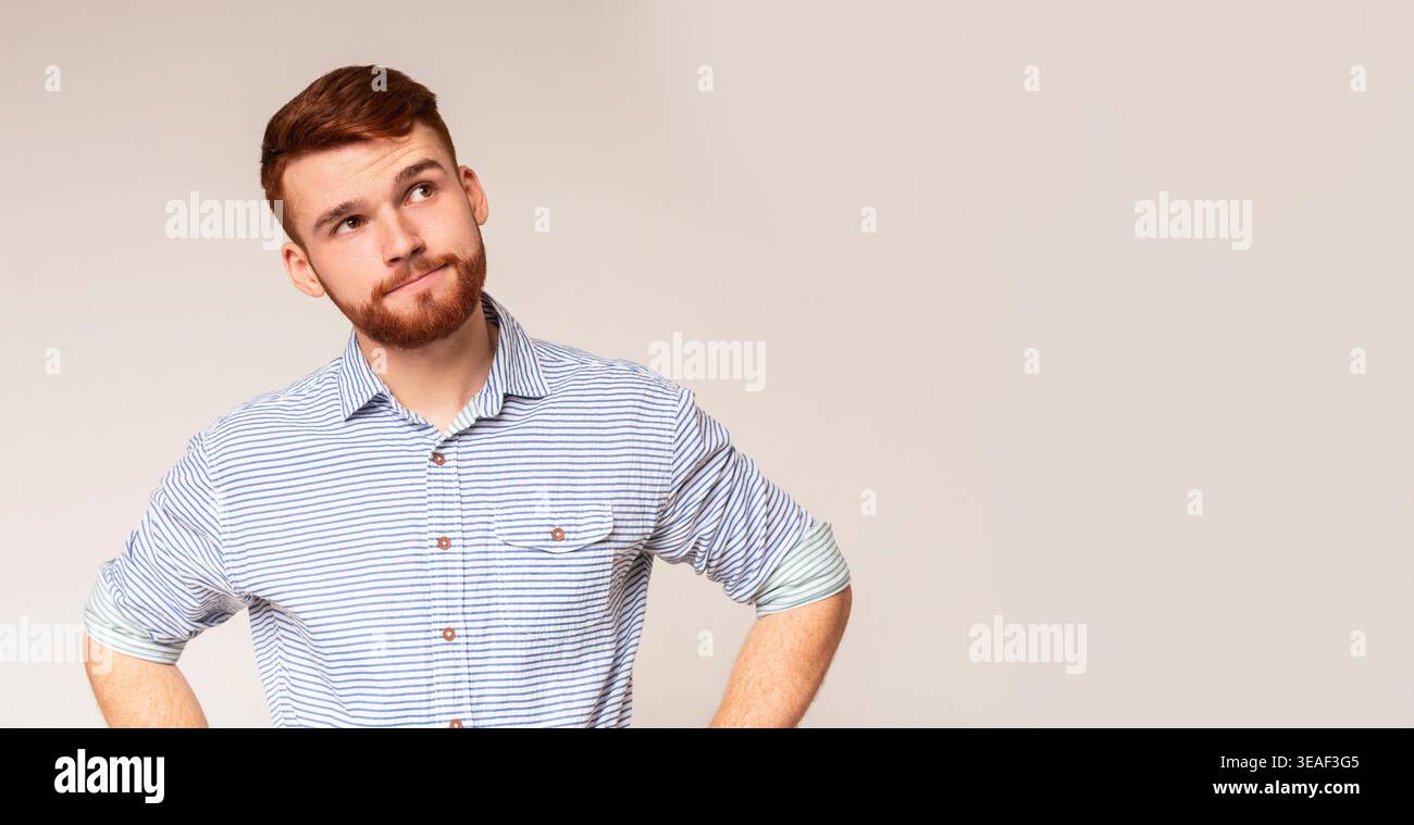 Thoughtful man looking away at copy space Stock Photo