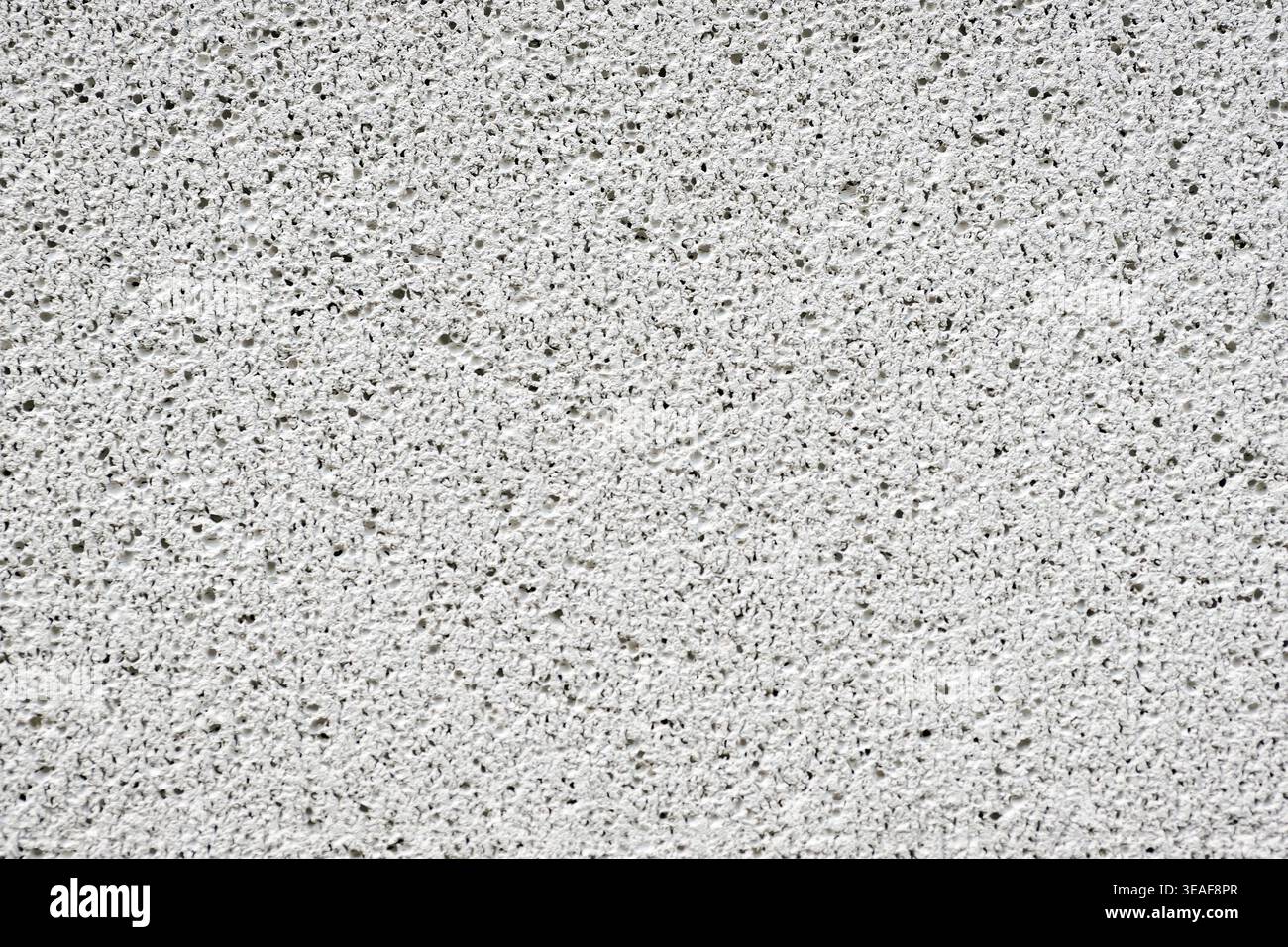 Rough porous lava stone surface. Texture, background. Stock Photo