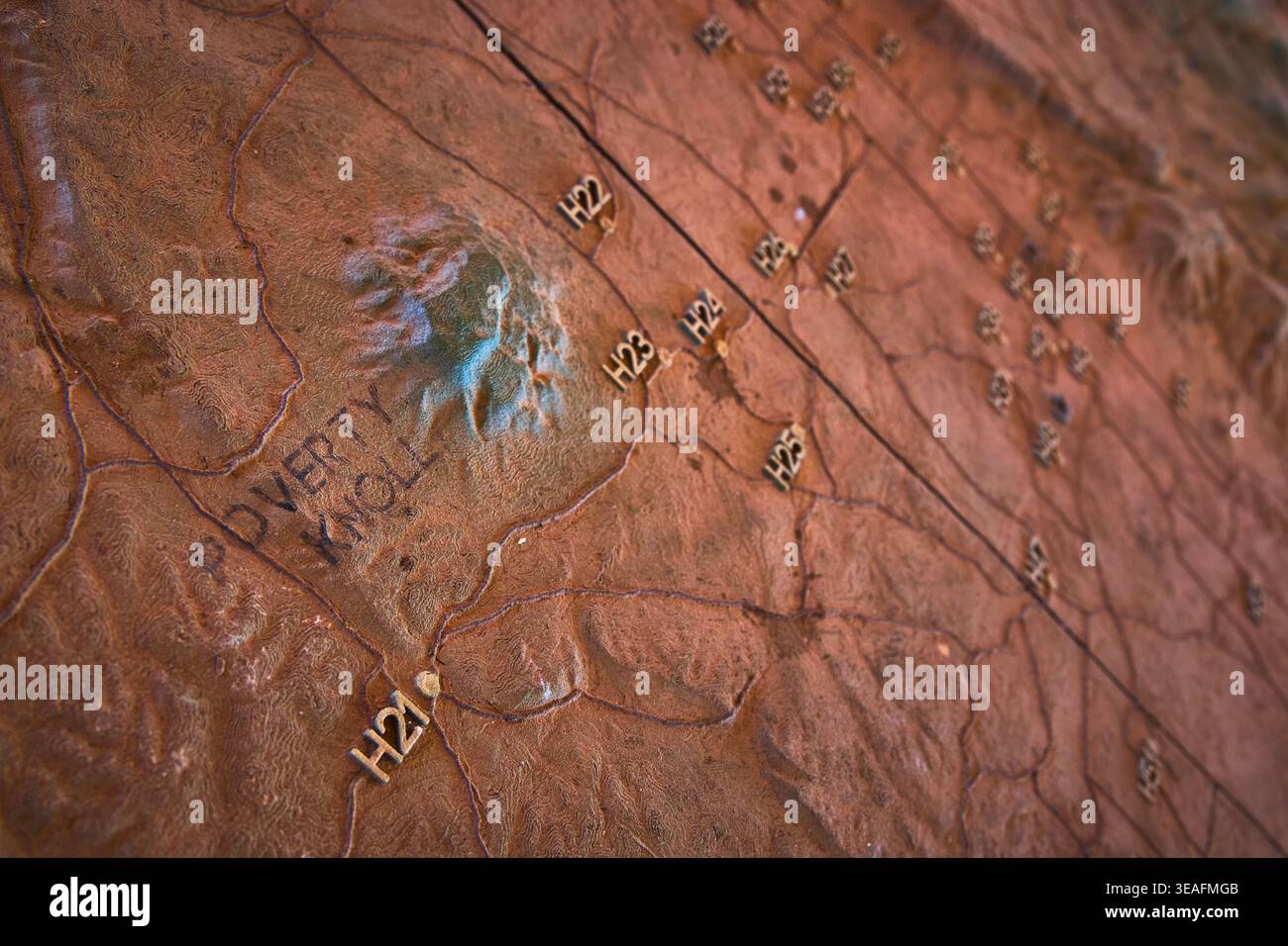 Textured Topographic Map Detail with Poverty Knoll and Grid Markers Stock Photo