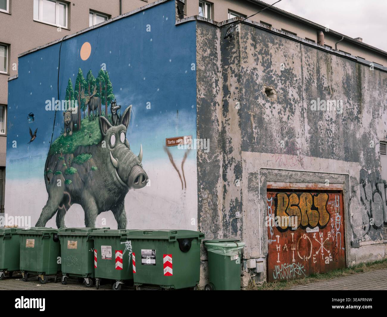 Giant wild boar mural with forest animals on apartment building wall at ...