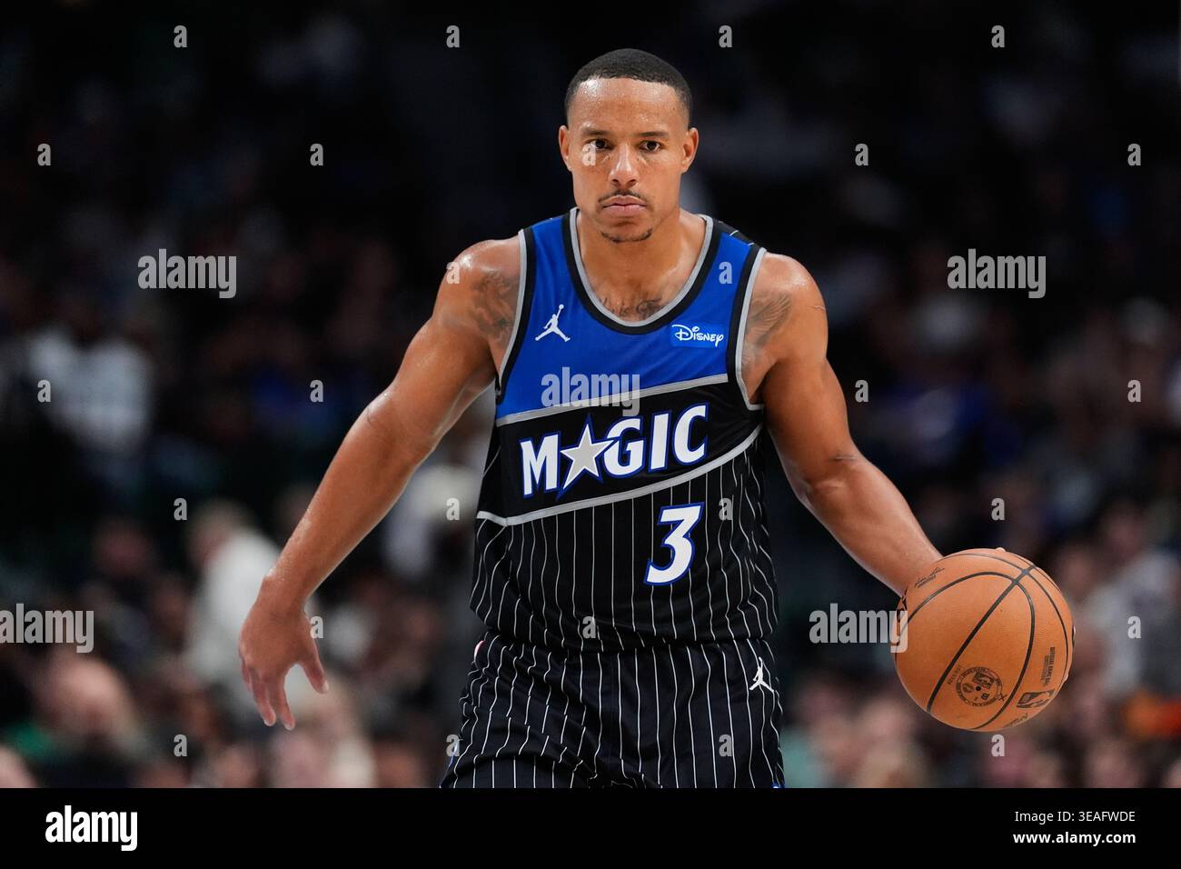 Orlando Magic's Desmond Bane handles the ball during an NBA basketball ...