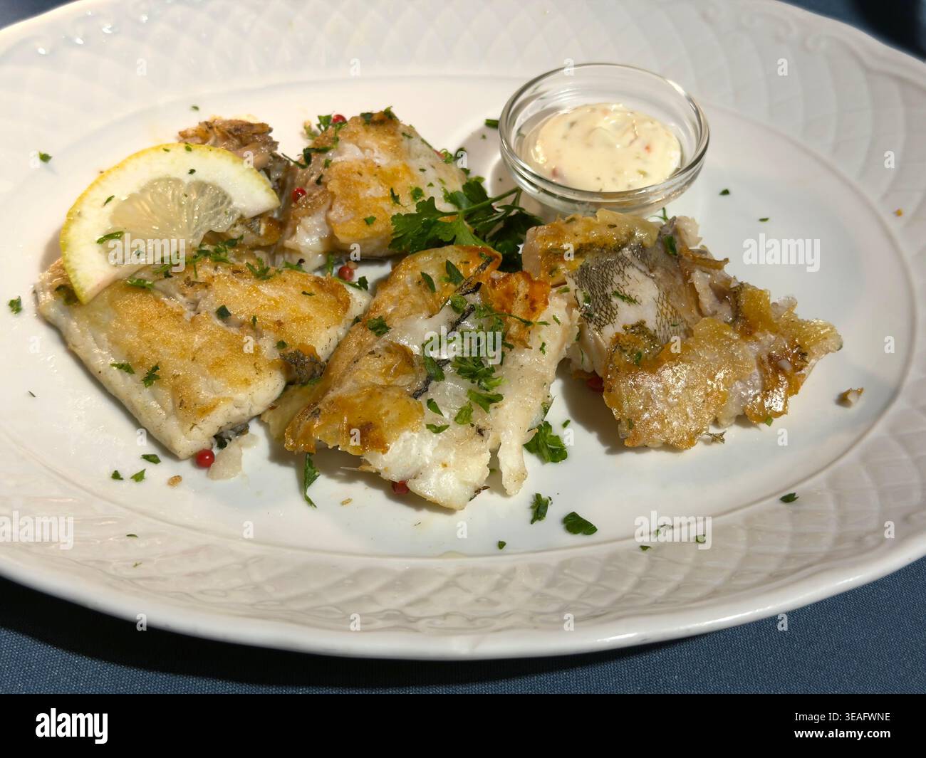 Plate of fried mixed fish Stock Photo