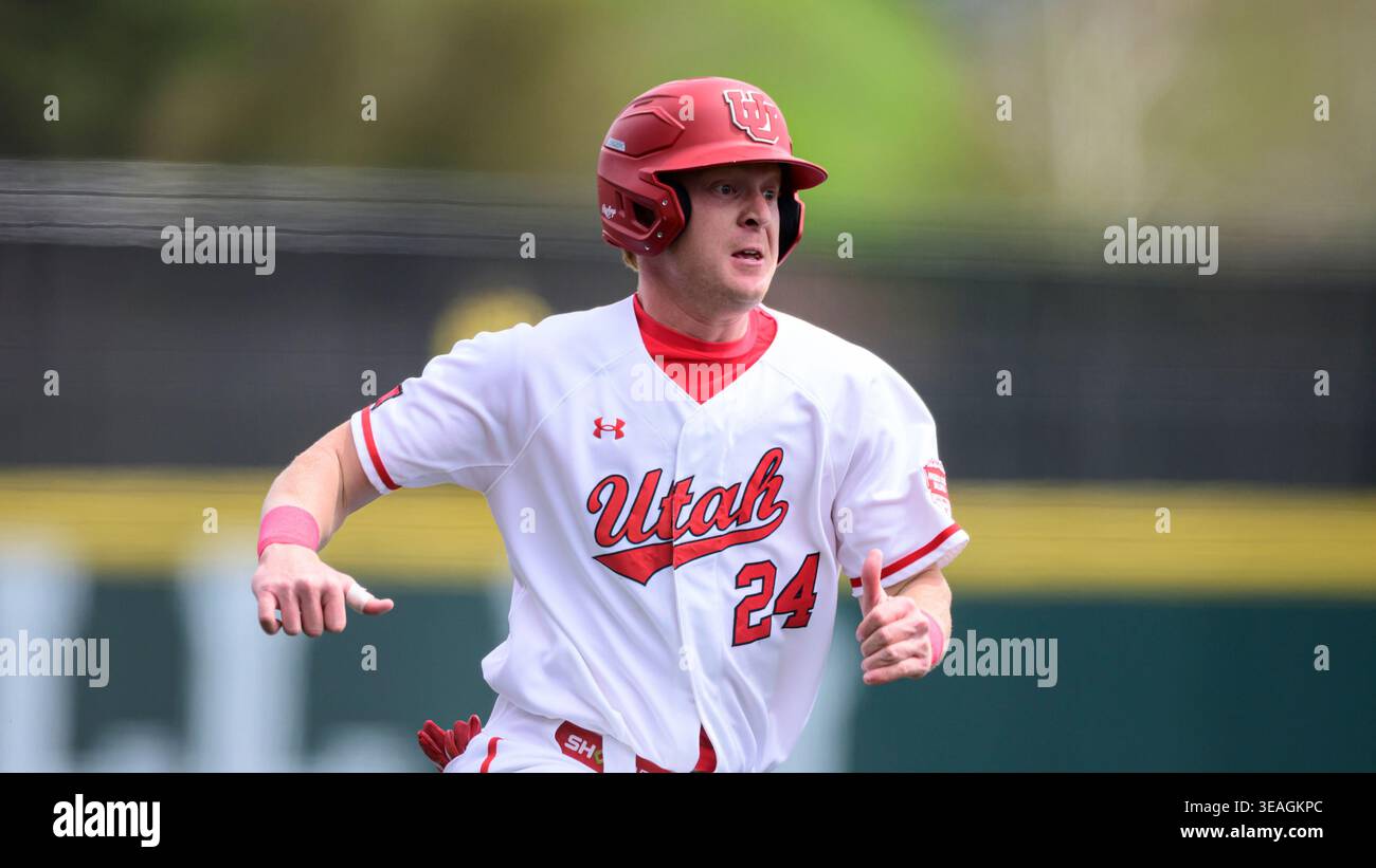 Utah outfielder Luke Jacobs runs to home plate during an NCAA baseball ...