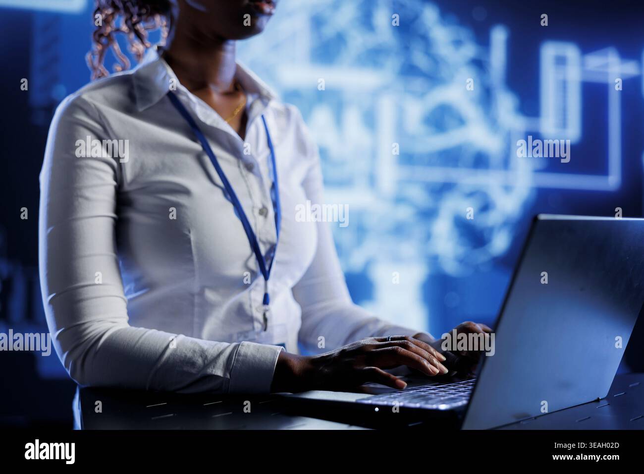 Certified technician developing artificial intelligence neural networks nodes modeled after human brain. Experienced worker setting up AI machine learning accurately making predictions using data Stock Photo