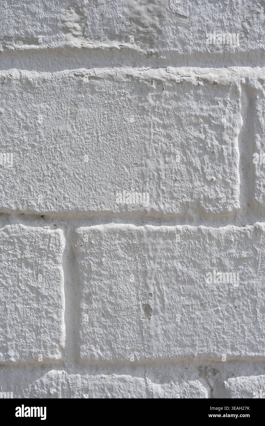 Bright White Painted Brick Wall Texture Background with Rough, High-Key Surface Stock Photo